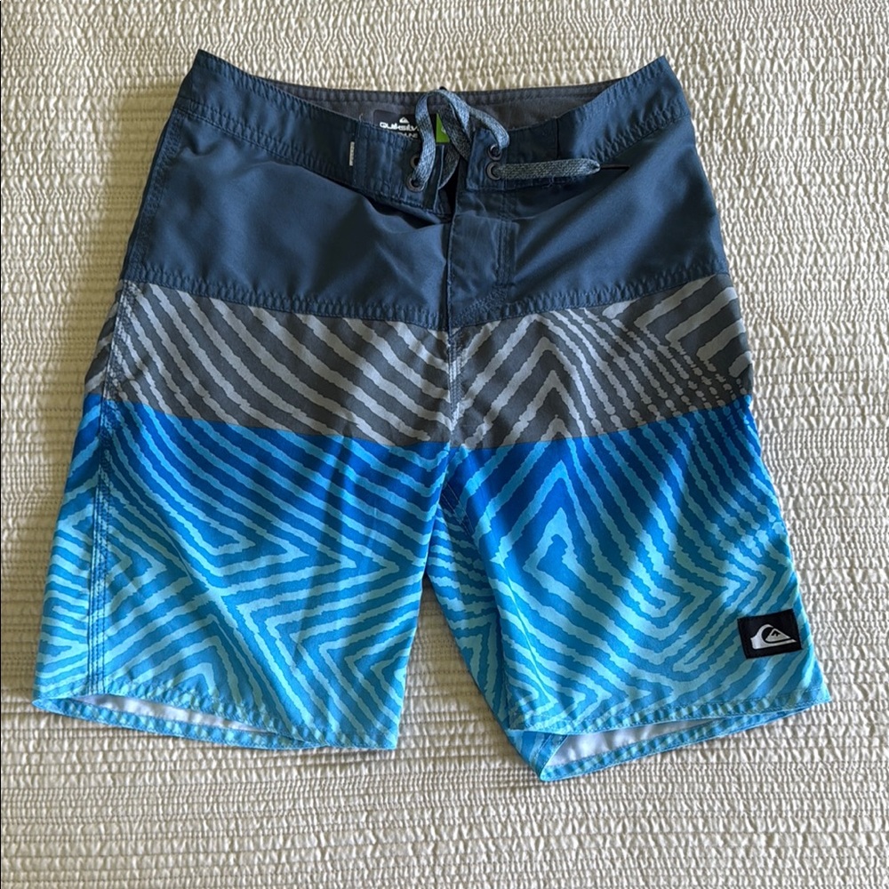 Quiksilver Blue and Gray Board Shorts with Gradient Design